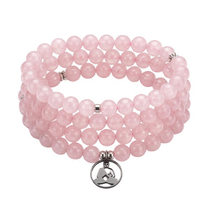 Mala 108 perles en quartz rose naturel – Fabrication française – Mala 108 perles en quartz rose naturel avec pendentif Bouddha assis en méditation en acier inoxydable.bouddha
