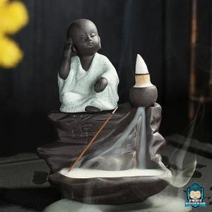 Brule-Encens-Bouddha-Noir-en-ceramique-moine-robe-coloris-vert-taille-environ-hauteur-9-cm-longueur-12-cm-largeur-6-cm-poids-470-grammes