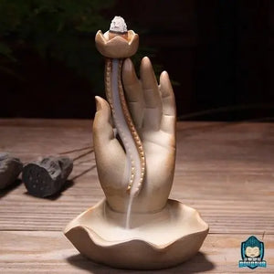 Porte-Encens-Main-de-Bouddha-en-céramique-dimension-hauteur-16-cm-environ-largeur-9-cm-environ-coloris-grès-taupe-La-Maison-de-Bouddha