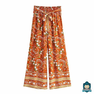 Ensemble-Fleuri-Femme-Pantalon-Orange-a-fleurs-blanches-ceinture-nouee-en-tissu-coupe-droite-fluide-La-Maison-de-Bouddha