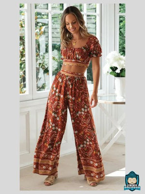 Ensemble-Fleuri-Femme-Pantalon-Orange-a-fleurs-blanches-et-haut-court-a-manches-courtes-coton-et-fibre-synthetique-ceinture-en-tissu-nouee-haut-fronce-La-Maison-de-Bouddha