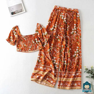 Ensemble-Fleuri-Femme-Pantalon-Orange-a-fleurs-blanches-et-haut-court-a-manches-courtes-froncees-decollete-rectangulaire-coton-et-fibre-synthetique-ceinture-en-tissu-nouee-La-Maison-d