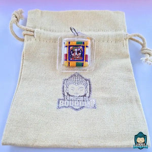 Amulette Tibetaine Yantra de Chenrezi béni avec ca pochette en lin