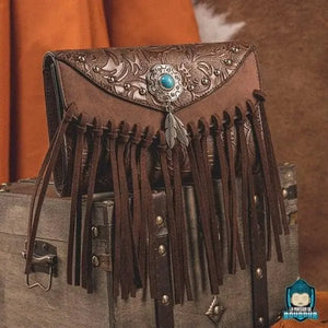 Sac-a-dos-cuir-vintage-ethnique-piece-ornementale-argente-perle-turquoise-et-plumes-La-Maison-de-Bouddha