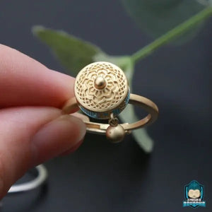 bague-tibetaine-tournante-couleur-or-en-laiton-ajustable-La-Maison-de-Bouddha